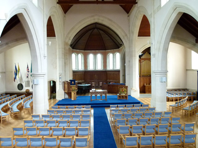 Photo of main church interior showing seating and altar