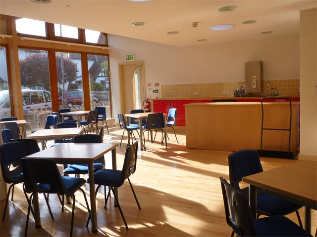 Photo of Bradbury Coffee Bar interior showing tables and kitchenette area